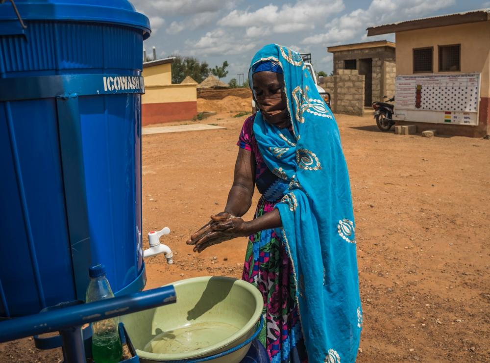 Ghana - Woman Getting Water