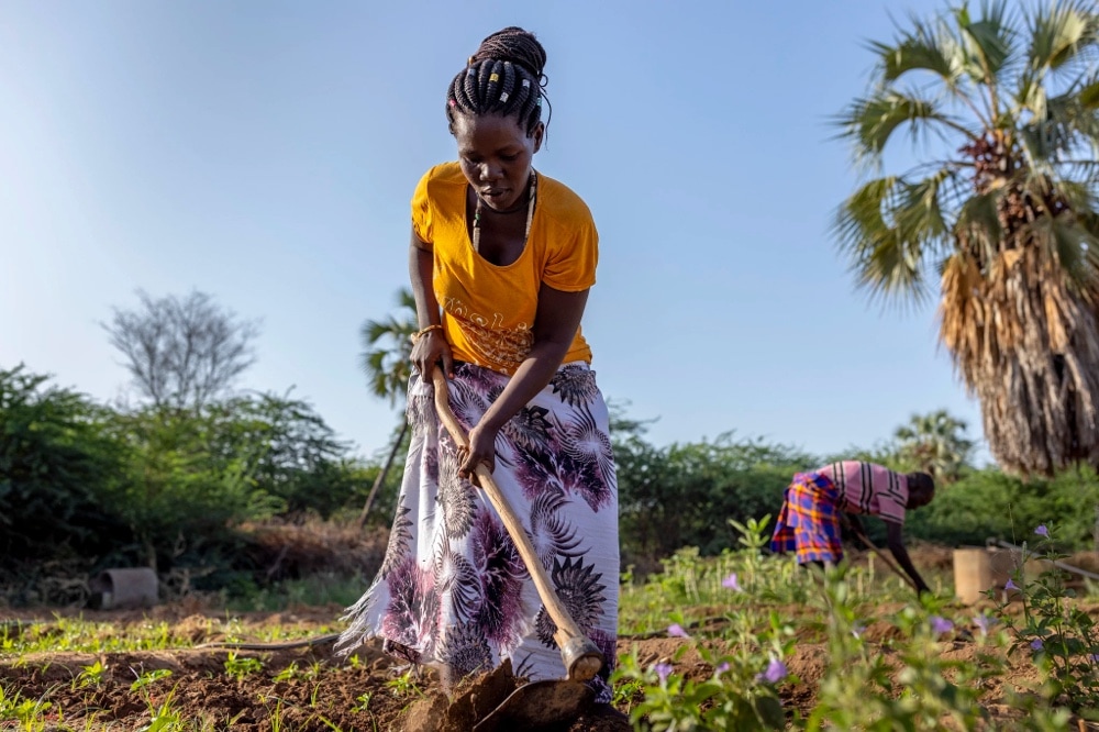 Woman working on farm in Kenya