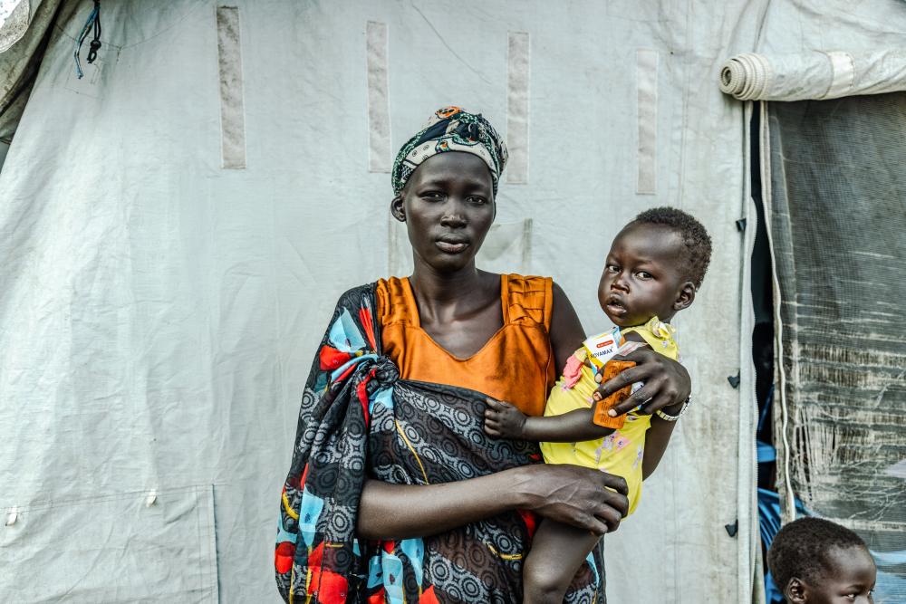 woman holding baby